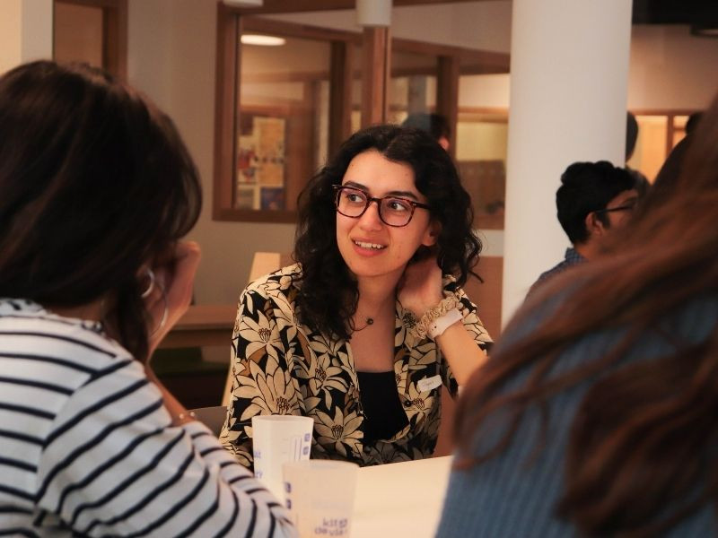Student participating in a peer-support discussion during Nightline’s Sentinelle suicide prevention training on a university campus.