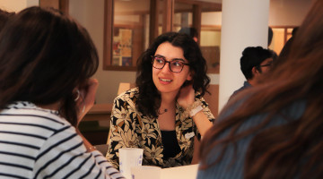 Student participating in a peer-support discussion during Nightline’s Sentinelle suicide prevention training on a university campus.